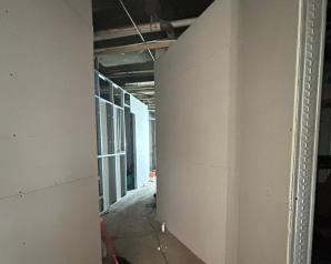 Calciboard boarding along the corridor